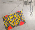 bolso tipo clutch de estilo boho/étnico